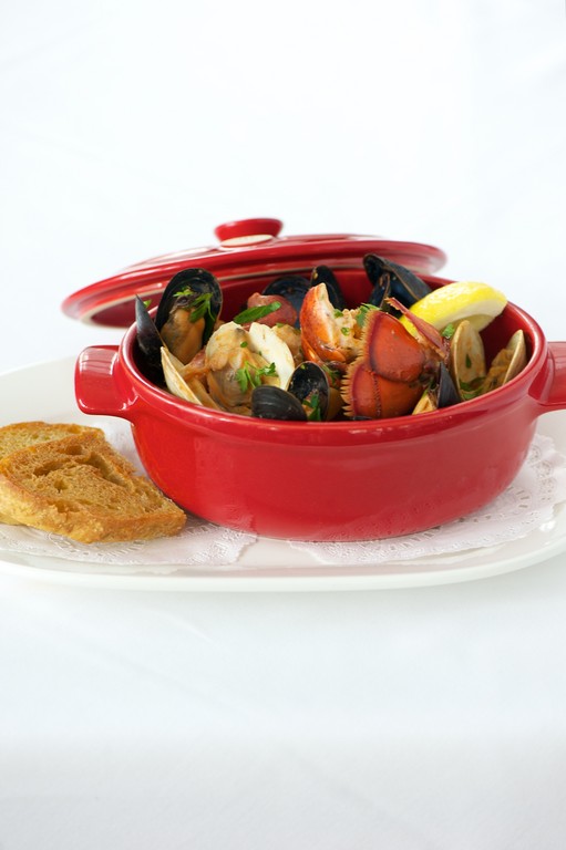 Jamestown Fish Crockpot with lobster, mussels, clams, scallops, monkfish, potatoes and chourcio