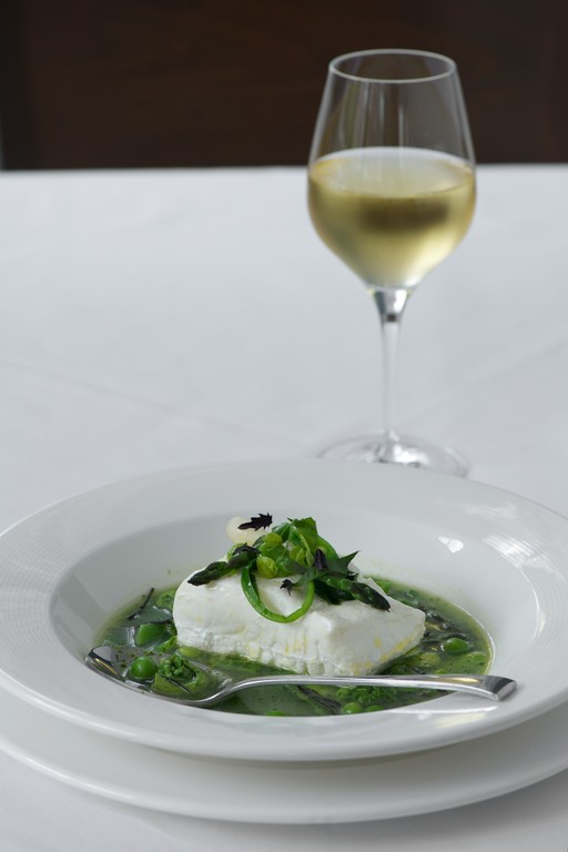 Line caught Maine Halibut with basil broth and spring vegetables